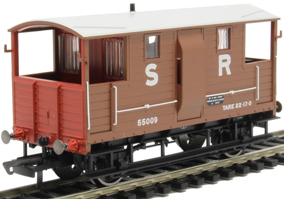 R6913A ex-LSWR 24 ton brake van 55009 in SR brown with red ends